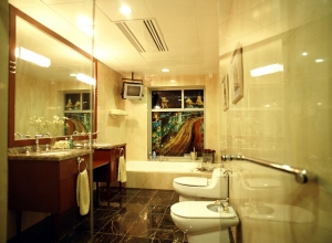 Modern Bathroom with Glass Shower and Large Mirror